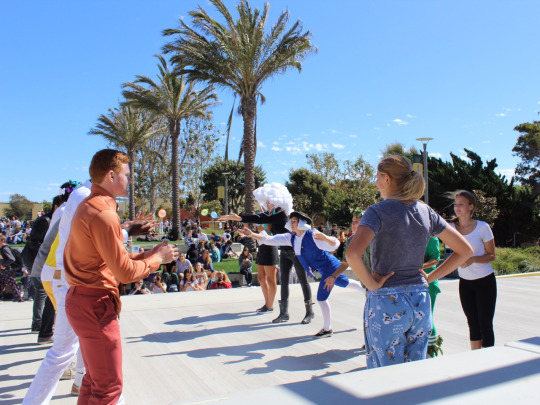 Twelve homecoming court members participate in an intense water balloon toss as part of a daily lunch activity throughout homecoming week. Seniors Delaney Kluth and Max Taylor were the last to stand.