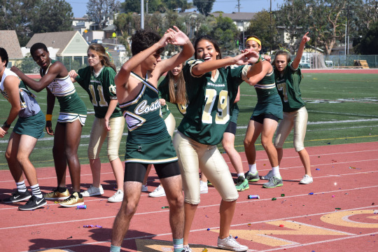 Danielle Gonzales and Nico Brunstein are bumping hips in their duet on Friday during the Pep Rally. The homecoming court nominees choreographed a dance to perform in front of Costa students, and each couple had their own duet to perform as well.