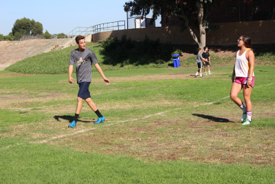 Sophomore Evan Anderson asks the coach about a drill they are about to do. 