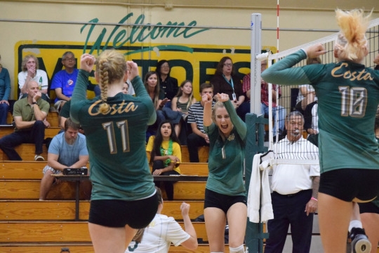 Senior Alexa Underwood celebrates a kill to close out the third set of the match.