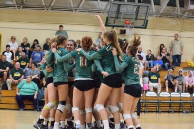 The Girls Varsity Volleyball team celebrates their win over Edison High School in the CIF Southern Section quarterfinal on November 5, 2016.