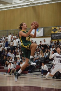 Senior Cameron Steen puts up a successful layup to contribute to the Mira Costa boys basketball team’s victory against Torrance on the night of December 13th at Torrance High School.