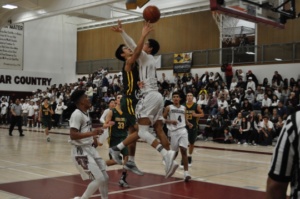 Senior Brandon Chan shoots the ball in the 4th quarter of the game.