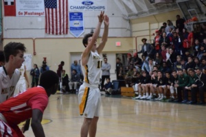 Junior Bobby Barkley shoots two free throw baskets after getting fouled by a Redondo opponent.