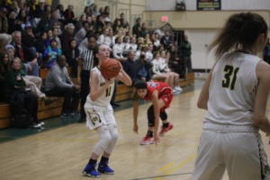 Herdman winds up to shoot a 3-pointer after stunting her Redondo Beach opponent.