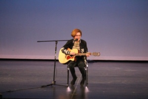 Senior Amber Manley sings an acoustic adaptation of a James Arthur song while playing the guitar. 