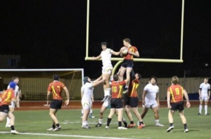 Senior Alec Oshita gets lifted in the line-out after Torrey Pines threw the ball out of bounds. Oshita later went to get the ball for the Mustangs and winning in many line-outs. 