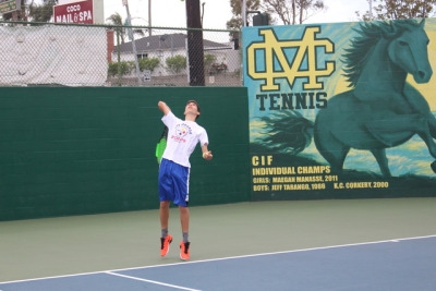 Sophomore Brian Kaiserman serves the ball to his partner to get the practice match started. The F/S team practiced after school from 2-4pm to get ready for their next game. 